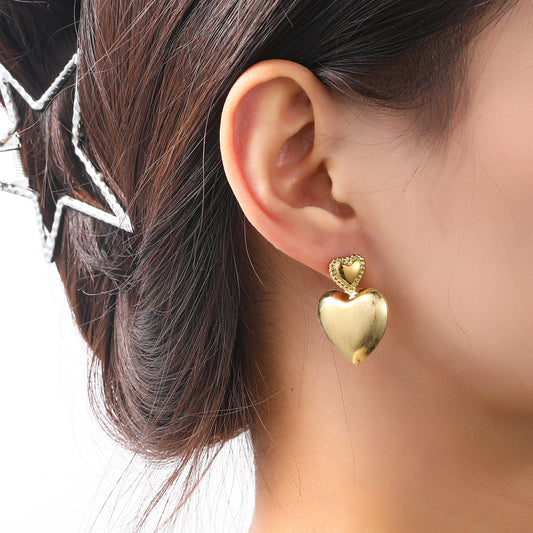 E5434-2 Oorbellen Hollow Heart